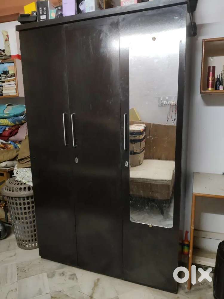 Wooden triple door almirah