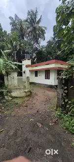 10 cent plot with a small house near chalakudi