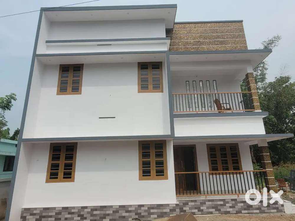 A SUPERB NEW 3BED ROOM 1600SQ FT 5.5CENT HOUSE IN MG KAVU,THRISSUR