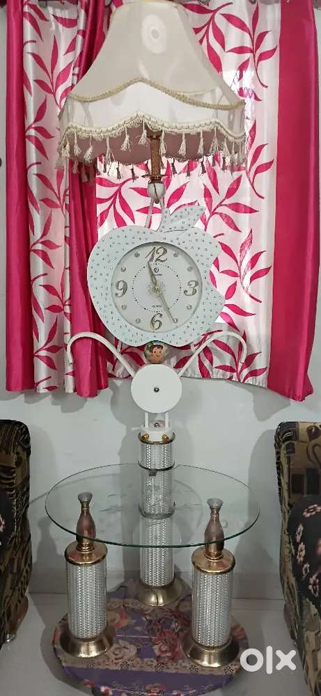 Glass table with clock coloured light