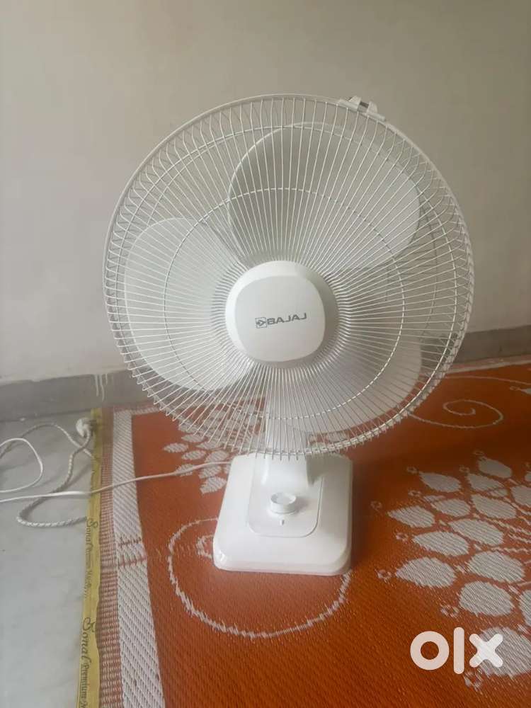 Almost New Bajaj Table Fan  Used Only 2 Days  With Warranty
Card