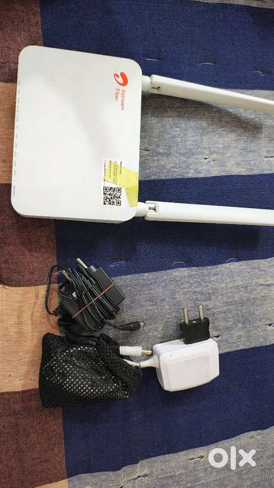 Airtel Xtreme wifi router with two adapter.