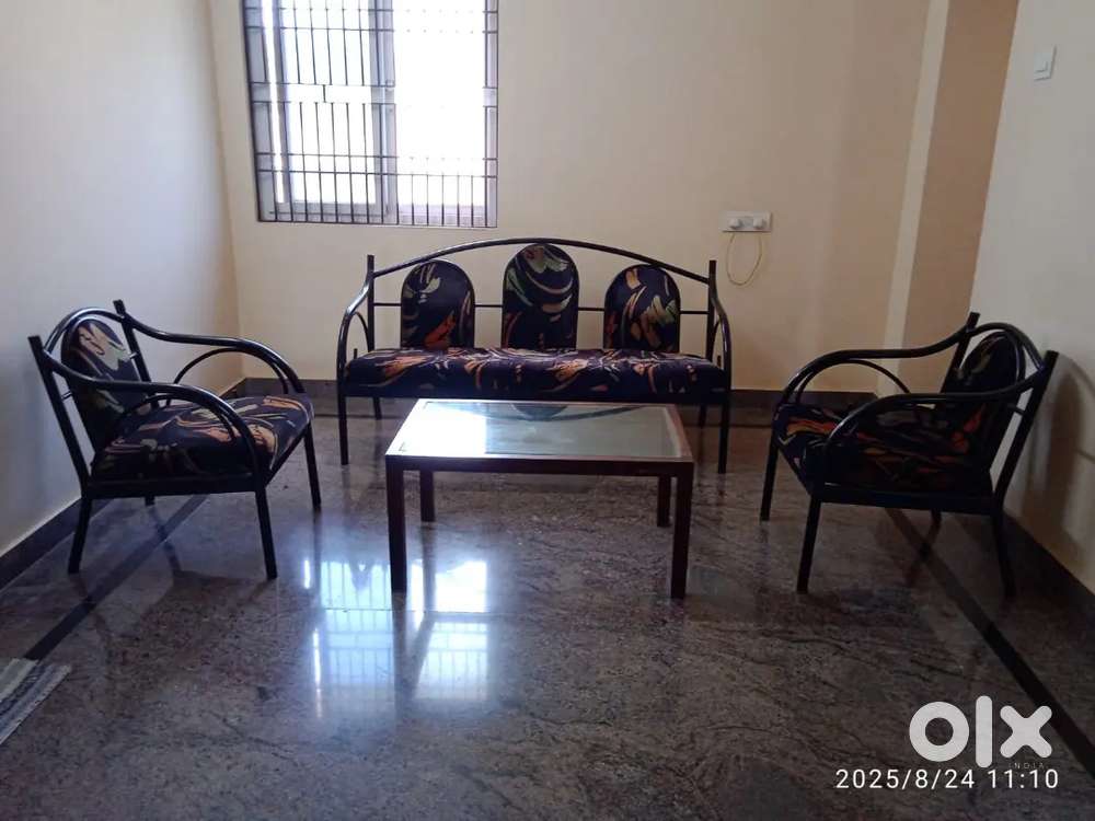 Sofa and  glass top center table