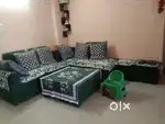 L shape sofa 8 seater in good condition with center table