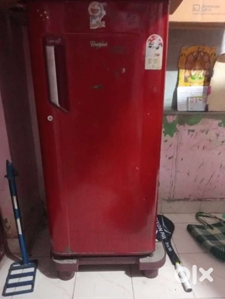 Selling red colour fridge