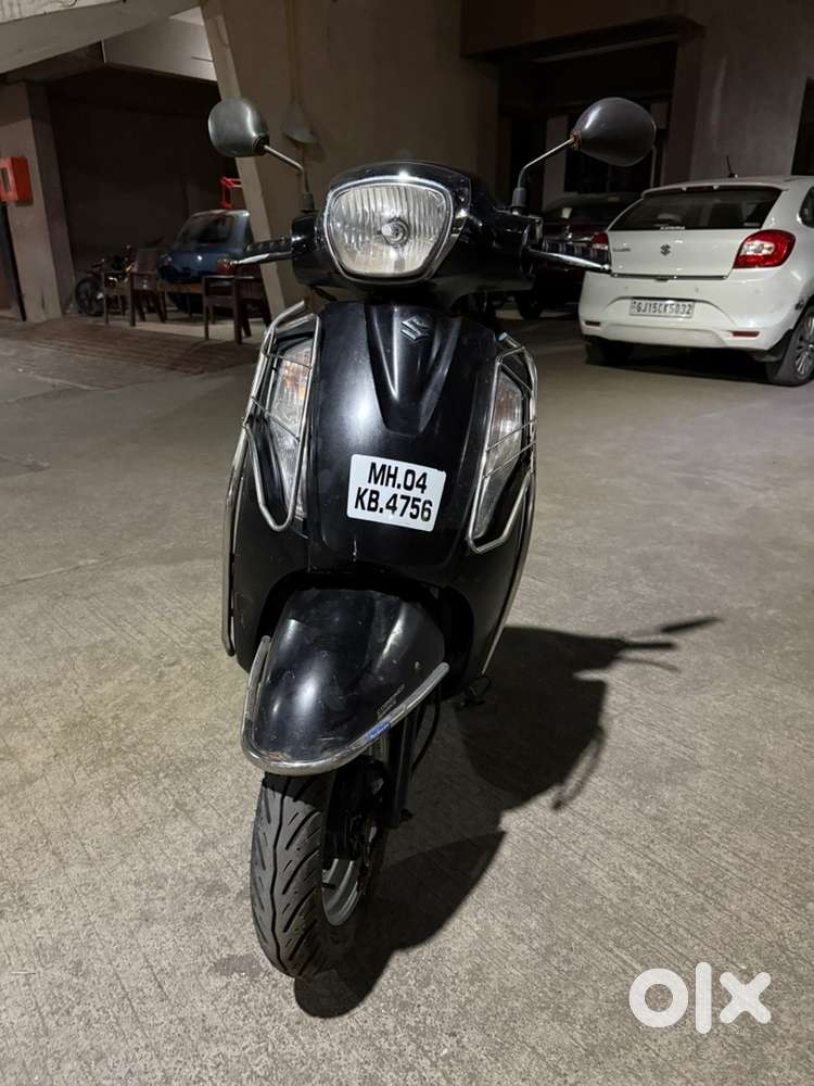 Black in colour almost like new with new tyre 40plus average