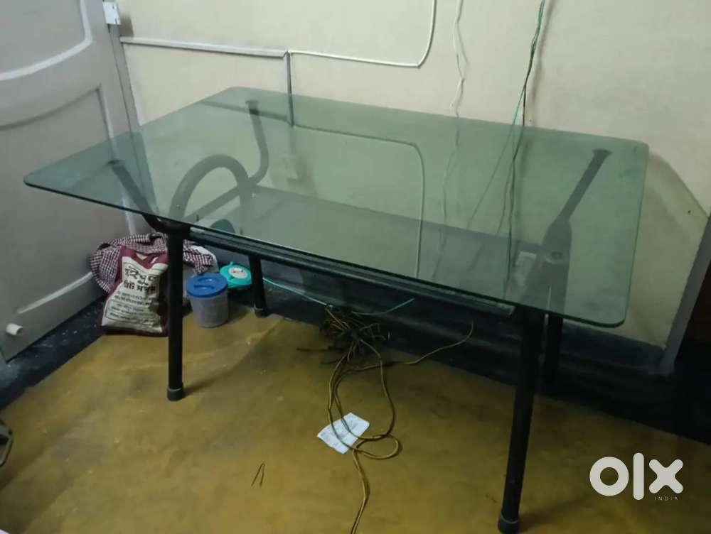 Urgent sell Glass table (iron structured) with two chairs