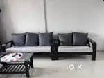 7 seater wooden sofa and table