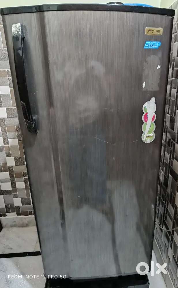 Godrej refrigerate 235 liter 5 star's good conditions and working