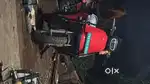 The scooter is Ola s1x 3kw, the color of the scooter is red.