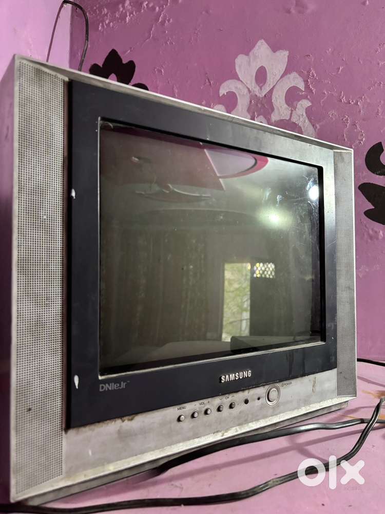 Tv In working condition with free DISH TV AND REMOTE