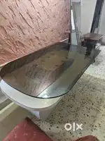 Glass topped sylish table for sale