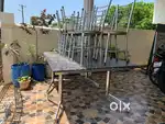 SS hotel table with granate top and SS chair