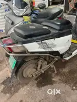 Jitendra motor vehicles EV scooter with charger