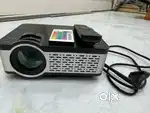 Home Theater Combo - Full HD Projector + Fire Stick + Screen + Stand