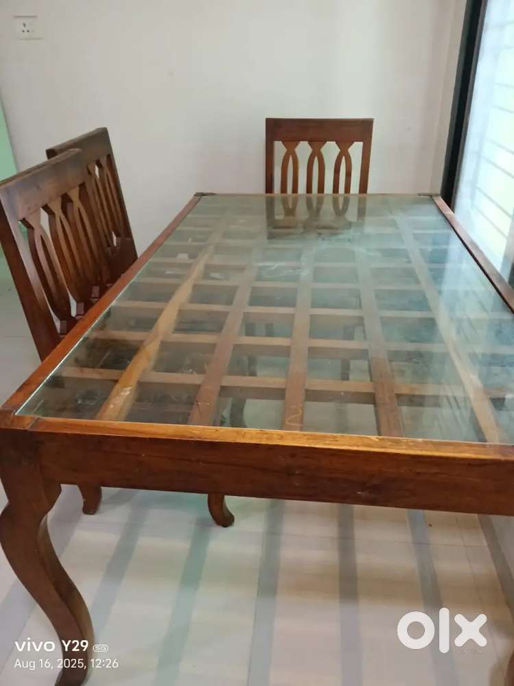 I have to sel my wooden dining