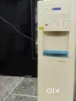 Water dispencer with small fridge