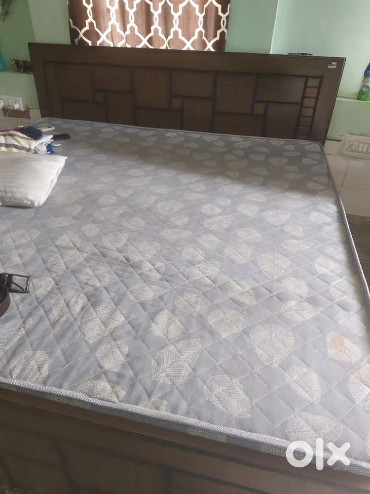 Double bed with bedsheet
