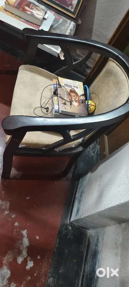 2 luxurious wooden chairs with tea table