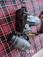 NIKON D5200 DSLR CAMERA WITH 32 AND 64GB MEMORY CARD AND 55-300MM LENS