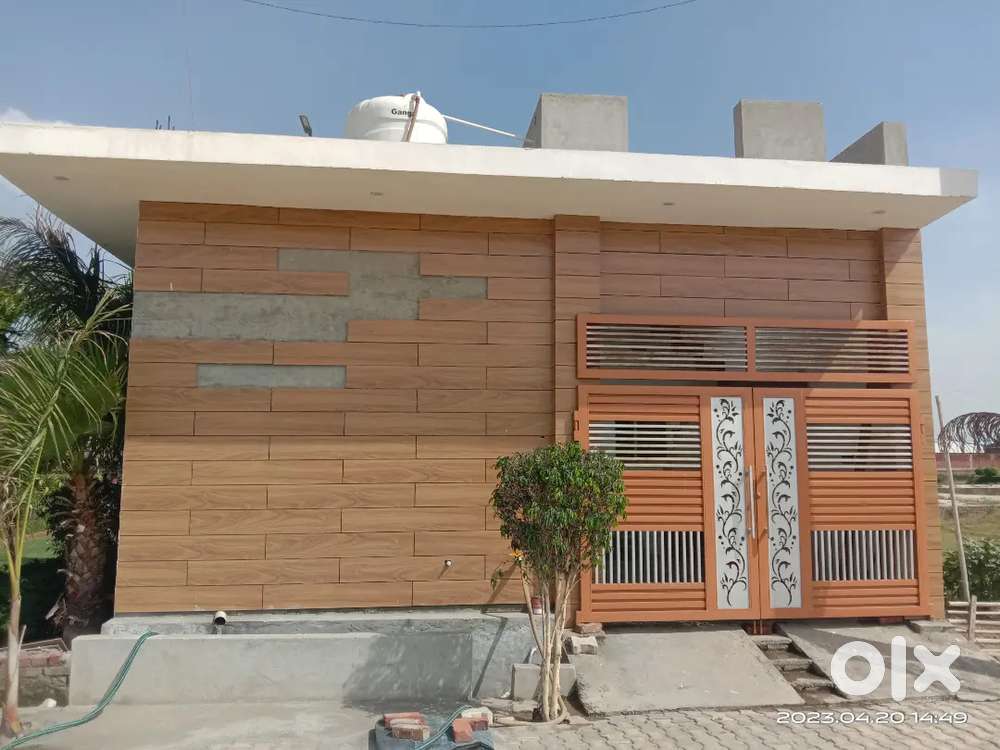 100 Yards plot in a gated township on national highway