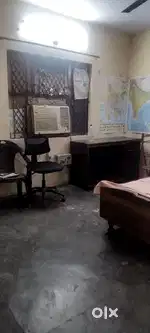 2 room flat one occupied and 1 room left with two beds