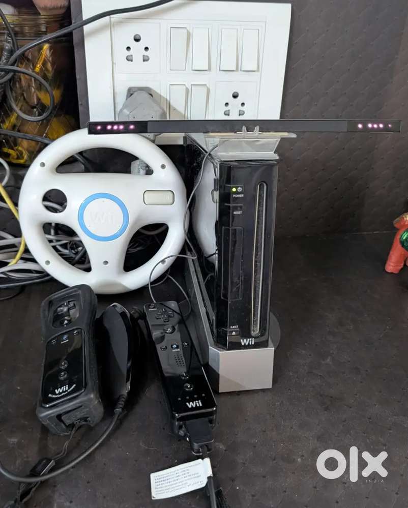 Nintendo Wii with Mario Kart Steering & Sports Games