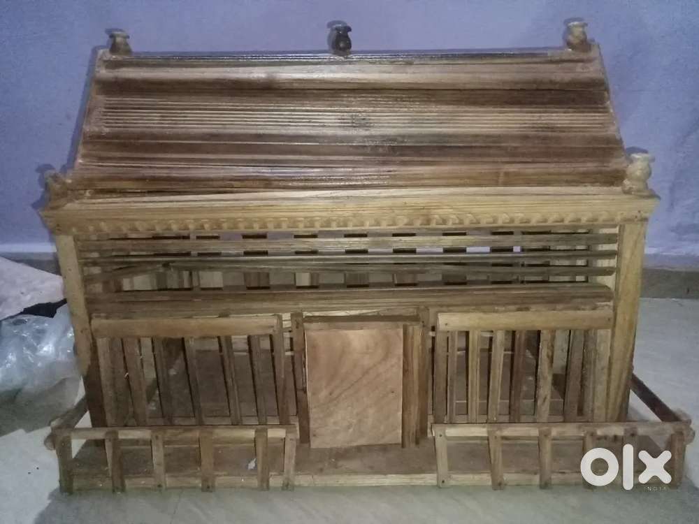 It is a handmade wooden house