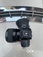 sony M3 with lens 50mm aprture