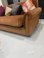 Teak wood sofa with cushions