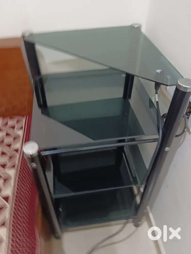 Glass corner table