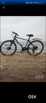 Bicycle in Excellent Condition -OMO Alloy Frame with lock and helmet