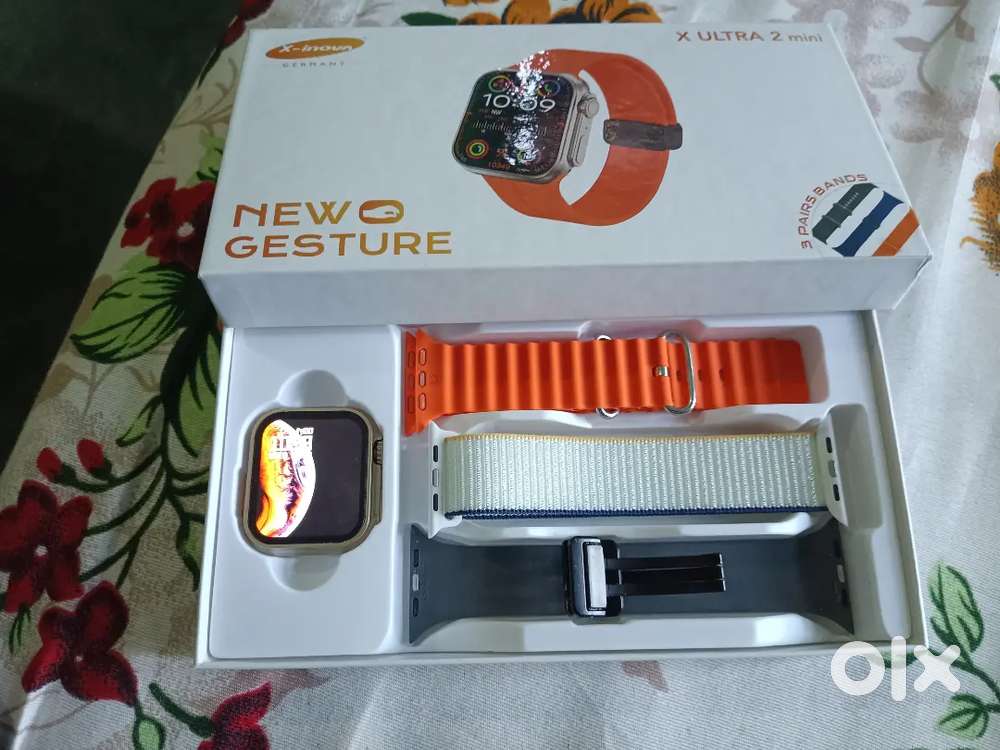 X Ultra 2 mini smart watch (3 original bands and charger)