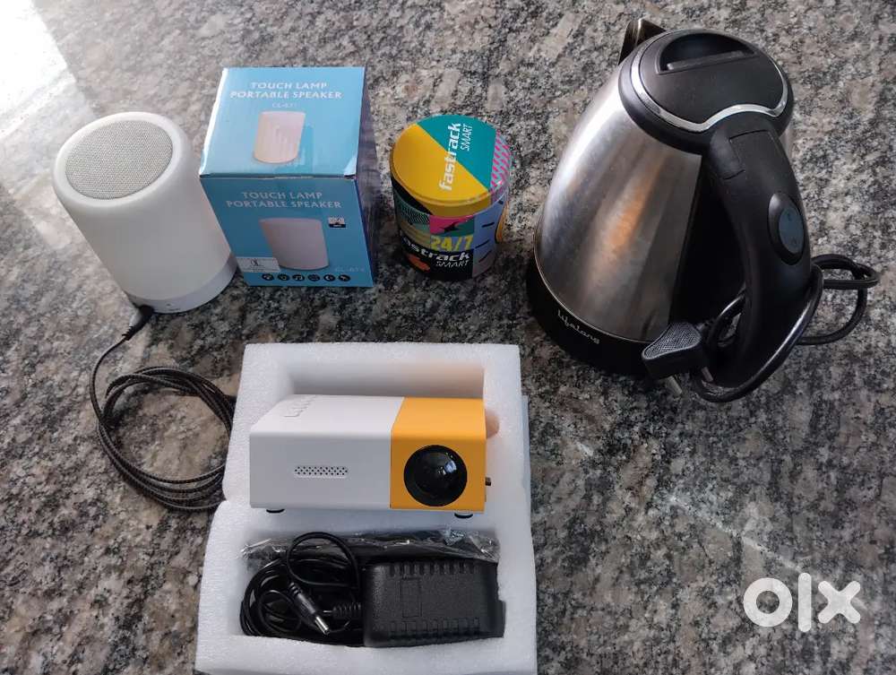 Projector Smart Watch Bluetooth Speaker and Electric Kettle