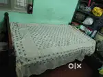 Wooden double cot