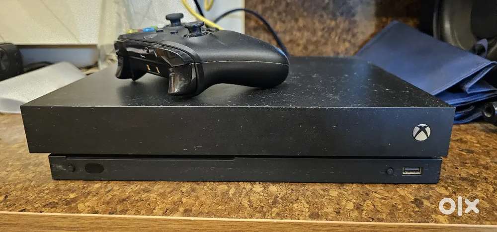 Xbox one x in prestine condition 1tb storage and 1 controller