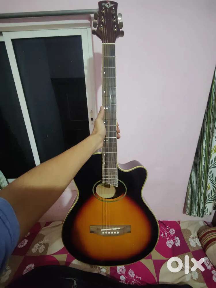 Acoustic guitar with capo