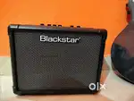 Electric guitar with amplifier