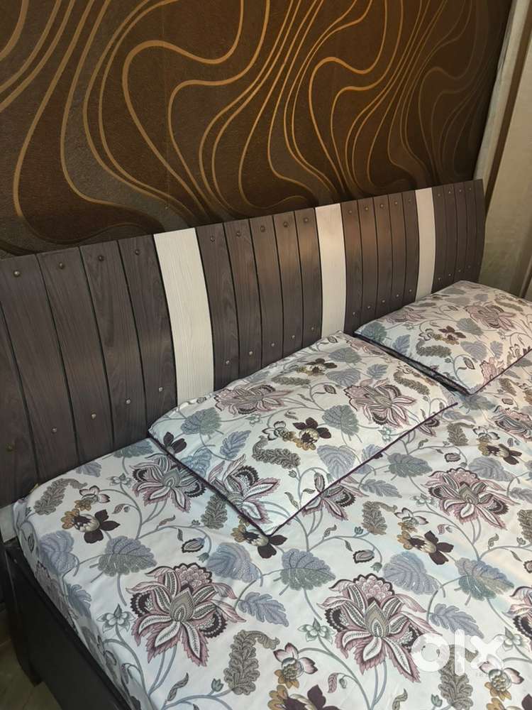 Bed, side table and sofa