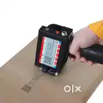 Avant garde handheld ink jet printer