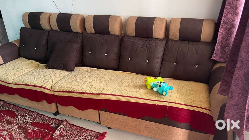 L shape fabric sofa and steel cot