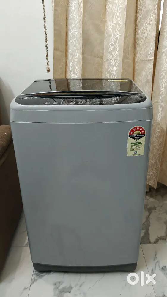 LG 9 kg Top load fully automatic washing machine.