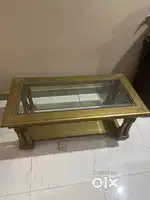 A centre table with glass top
