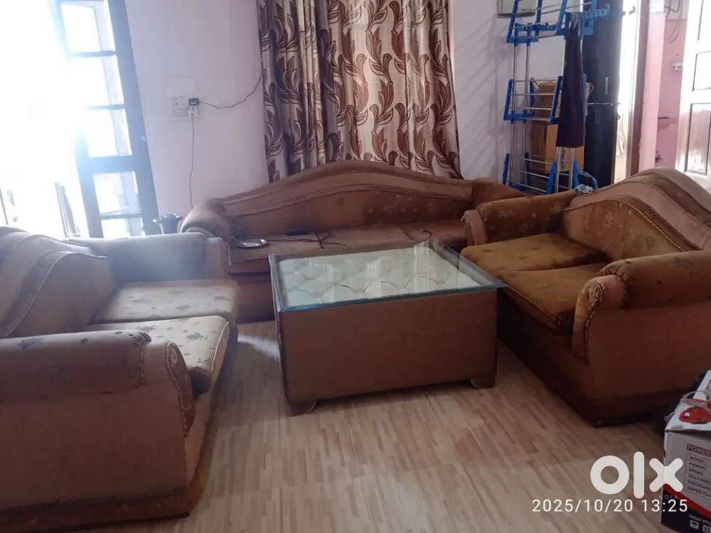7 seater sofa with center table table.