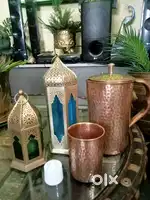 Copper water Jag with glass and lantern