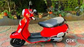 Vespa urban club , Dragon red colour,