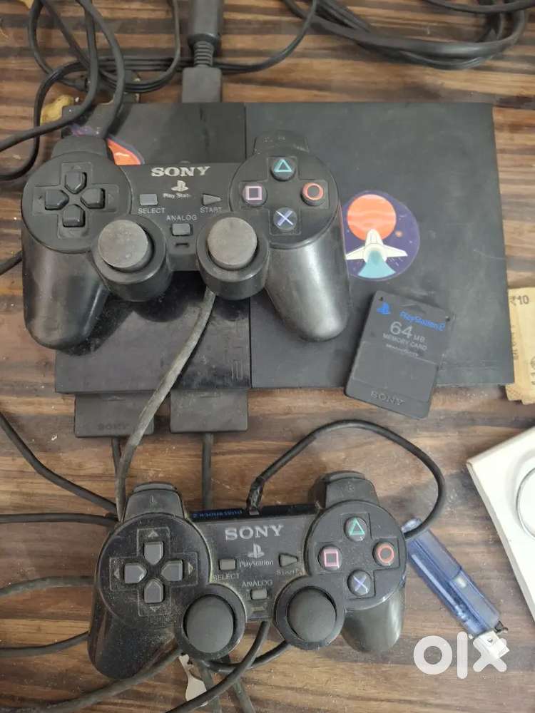 Sony playstation 2 slim in mint condition, with 2 dualshock controller