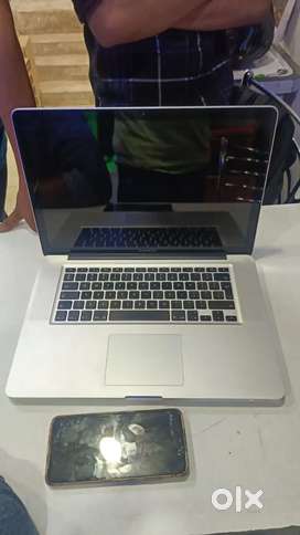 Apple Macbook pro a1990  ci7 15.4 inch display touch bar 3-hr battery