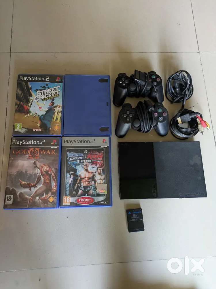 PS2 Console + 4 Games + 2 Controllers + Card - Only ₹1000