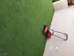 Wolf garten lawn mower.2 years old.12 inches blades .